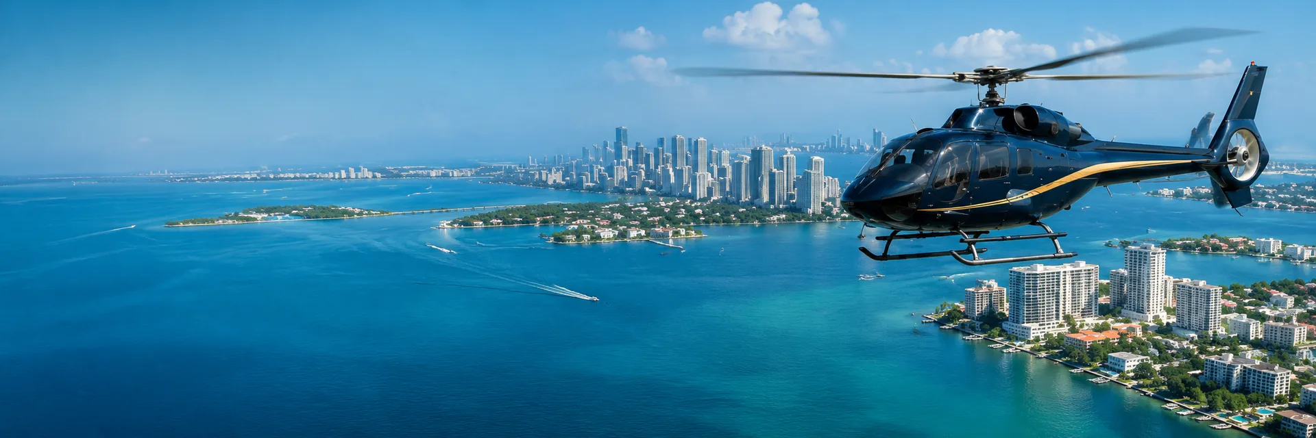 A helicopter over Biscayne Bay with the Miami skyline standing behind the islands