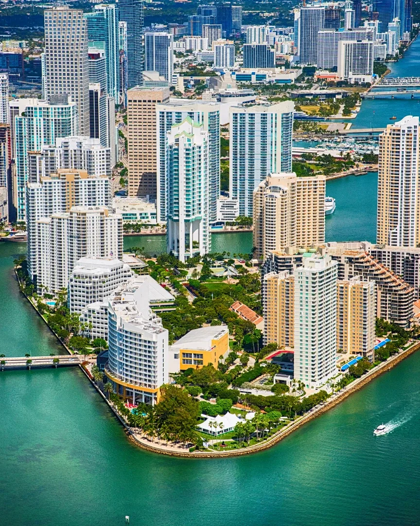 Downtown Miami from the air, high rise towers on Brickell Key with Biscayne Bay around them
